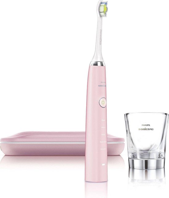 Roze Philips Sonicare tandenborstel met opzetborstel, oplaadglas en plat roze reisetui.
