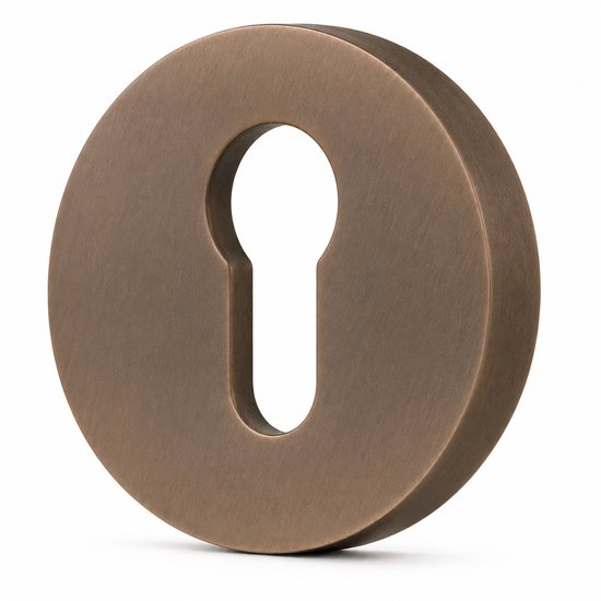 Bronzen rozet met sleutelgatuitsparing, voor een cilinderslot.