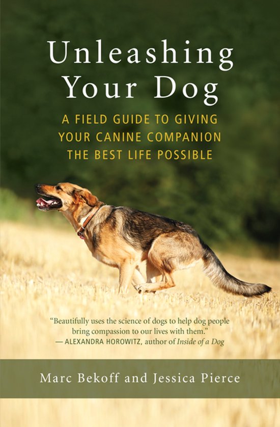 Boek "Unleashing Your Dog" met een bruin-zwarte hond op een veld, met de tekst "A FIELD GUIDE TO GIVING YOUR CANINE COMPANION THE BEST LIFE POSSIBLE".