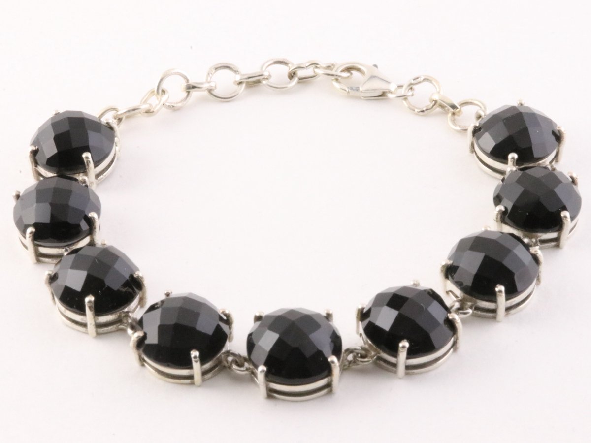 Zilveren schakelarmband met gefacetteerde onyx