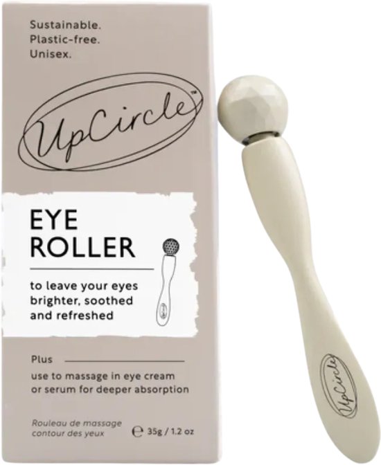 UpCircle oogroller met verpakking. De roller is beige met een gedraaid uiteinde.
