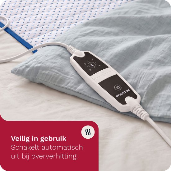 Detailopname van de elektrische onderdeken met witte controller, die automatisch uitschakelt.