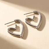 Lundholm Hartjes Oorstekers Dames Zilver Kleurig - Geometrische Hartjes Oorbellen - Oorbellen Hart - Premium Stainless Steel Jewellery - Hypoallergene Sieraden - Sinterklaas Cadeautjes - Bedankt Cadeautje - Cadeau Collega - my Lundholm