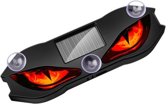 Zwarte auto-accessoire met opvallende, rood oplichtende duivelsogen en een geïntegreerd zonnepaneel met zuignappen.