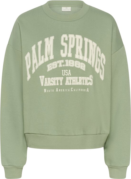 Lichtgroene sweater met 'Palm Springs Est. 1982 USA Varsity Athletics North America. California' opdruk in gebroken wit.