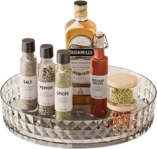 Plateau tournant transparent en forme de diamant avec des bouteilles de whiskey Bushmills, du ketchup, du sel, du poivre et des épices.