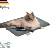 Langharige kat op een grijze verwarmingsmat met bedieningspaneel, met "German Engineering" logo.