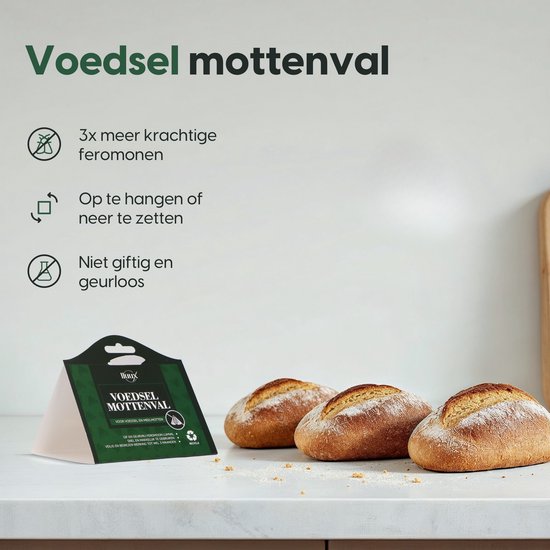 Drie broden op een aanrecht met een lluux voedselmottenval ernaast.