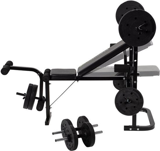 Zijkant van zwarte halterbank van Duke Fitness met halterstang, dumbbells en gewichtsschijven.