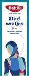 Blauwe verpakking met HeltiQ logo, tekst 'Steel wratjes' en afbeelding van een vrouw met stippen op nek en borst.