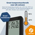 Zwart weerstation display met temperaturen binnen en buiten. Thermometericoon toont een bereik van -40°C tot 70°C.