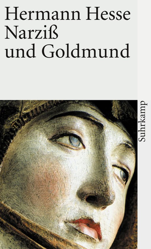 Livre "Narziß und Goldmund" de Hermann Hesse avec sur la couverture le visage d'une femme peint.