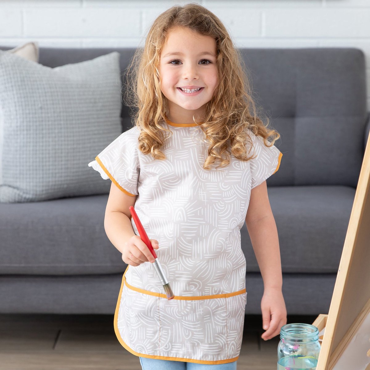 Bumkins Short-Sleeved Art Smock - Schilderschort met Korte Mouwen voor Kinderen - Kliederschort, Knutselschort en Verfschort - Waterdicht - Machinewasbaar - Wander - Beige Wit - 3-7 jaar
