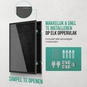 Zwarte wissellijst die openklapbaar is, met illustraties van ophangmaterialen.