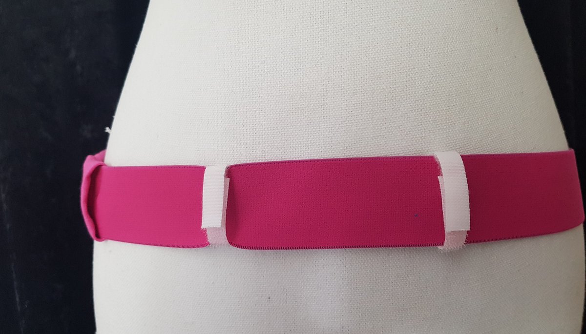 Goedkoopste PD-band voor peritoneale dialyse (nierdialyse), maat L, in roze huidvriendelijk (zacht) elastiek voor het opbergen van de katheter en het opbergen van het koppelstuk