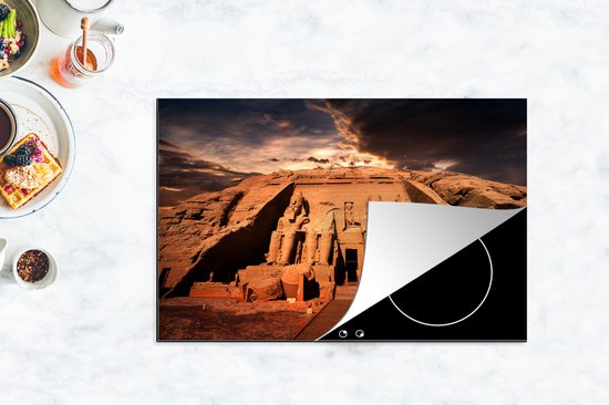 KitchenYeah® Inductie beschermer 81.2x52 cm - Wolken boven de Tempel van Aboe Simbel in Egypte - Kookplaataccessoires - Afdekplaat voor kookplaat - Inductiebeschermer - Inductiemat - Inductieplaat mat - Merkloos