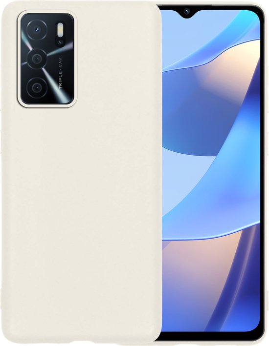 Petite coque de téléphone crème à côté d'un téléphone avec un écran bleu et blanc.