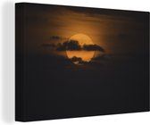 Canvas Schilderij Zonsondergang achter wolken bij de Golf van Mexico - 60x40 cm - Wanddecoratie