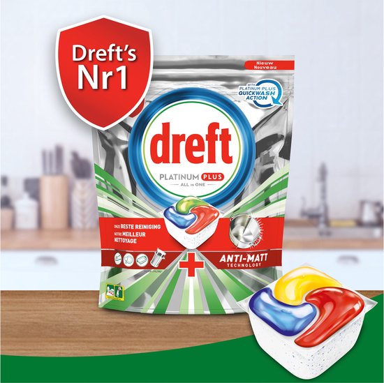 Verpakking Dreft Platinum Plus met deksel dat 'Dreft's Nr1' toont. Drie capsules liggen rechts.