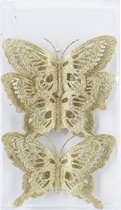 12x stuks decoratie vlinders op clip glitter goud 14 cm - Bruiloftversiering/kerstversiering decoratievlinders