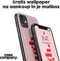 Coque de téléphone rose avec le texte rouge 'ugh.' et un téléphone avec le même design.