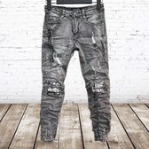 Grijze jeans met scheuren en witte print 96886 -s&C-134/140-spijkerbroek jongens