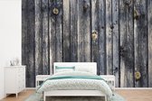 Fond avec une structure de planches fotobehang