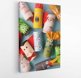 Canvas schilderij - Halloween monsters doll from toilet paper tube roll. Creative DIY for kids. Home decor for party. Paper handie crafts inspiration. Eco-friendly reuse recycle id