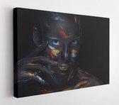 Canvas schilderij - Portrait of a young woman who is posing covered with black paint in the studio on a black background  -     368988482 - 115*75 Horizontal