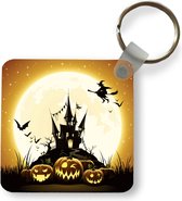 Sleutelhanger - Uitdeelcadeautjes - Een illustratie van een heks die over een kasteel vliegt tijdens Halloween - Plastic