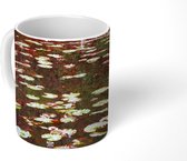 Mok - Kleurrijke waterlelies drijvend op het water in Monet's tuin in Frankrijk - 350 ML - Beker
