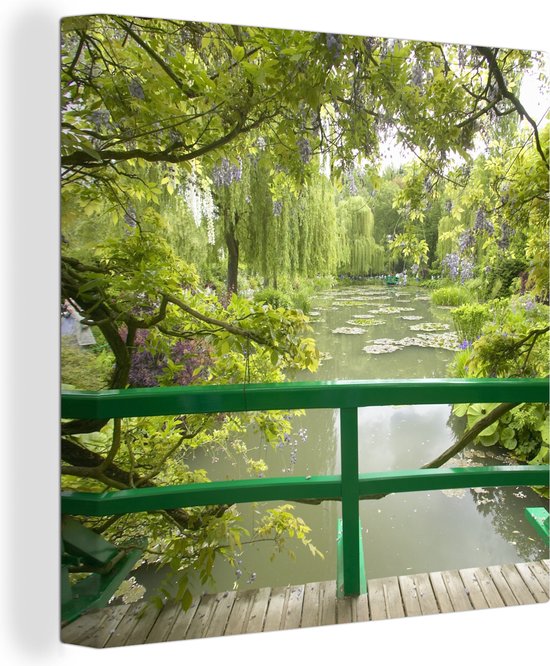 Canvas Schilderij Uitzicht op het water vanaf de Japanse brug in Monet's tuin in het Franse Giverny - Wanddecoratie