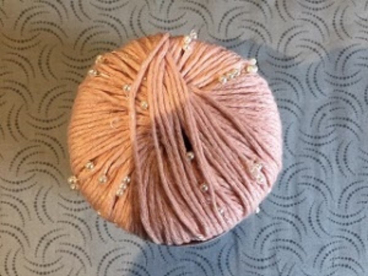 Schachenmayr breigaren Couture met pareltjes Nr 07857