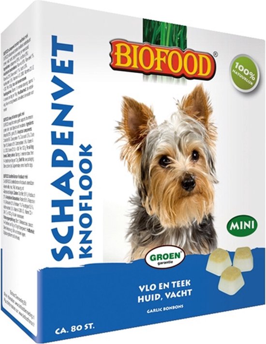 Verpakking Biofood schapenvet knoflook mini bonbons voor hond, met afbeelding van een Yorkshire Terriër en drie witte snoepjes.