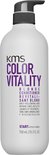 Witte fles KMS Color Vitality Blonde Conditioner met donkergrijze pomp.