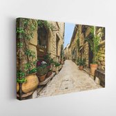 Narrow street in the old village Tourrettes-sur-Loup in France - Modern Art Canvas  - Horizontal - 233782048 - 80*60 Horizontal