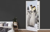 Deursticker Pinguïns - Sneeuw - Dieren - 90x215 cm - Deurposter