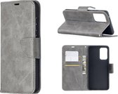 Samsung Galaxy A52 (SM-A525F) - Bookcase Grijs - Portefeuille - Magneetsluiting met 2 stuks Tempered Screenprotectors
