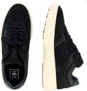 Blauwe sneaker van G-Star Raw, vista en zijaanzicht. Crèmekleurige zool en marineblauwe veters.