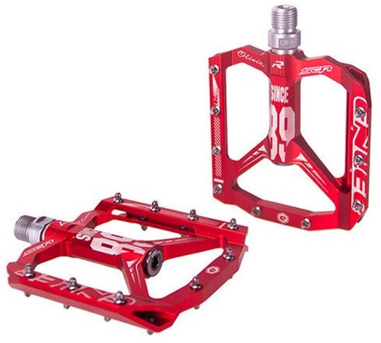 Rode aluminium CNC MTB pedalen met "SINCE R9" opdruk en metalen pins.