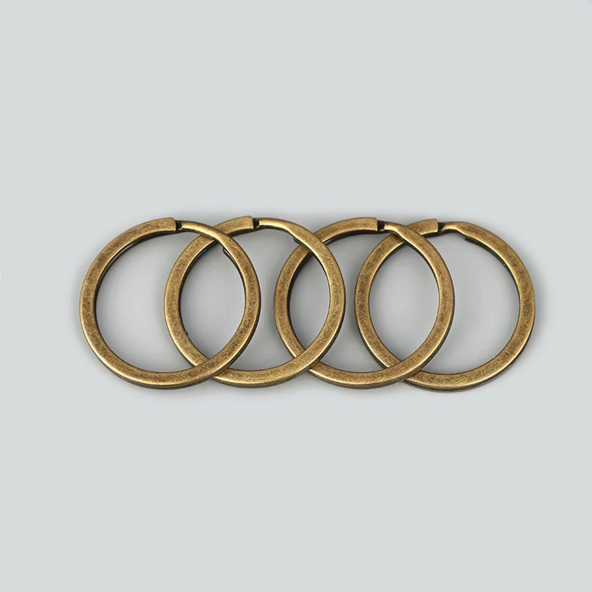 Set van 30 mooie sleutelringen (22-28 mm, kleur 1: brons)