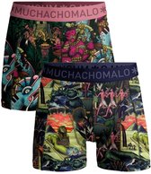 Twee Muchachomalo boxershorts. Eén met roze band, één met blauwe band. Beide met kleurrijke, drukke print met mythologische figuren.