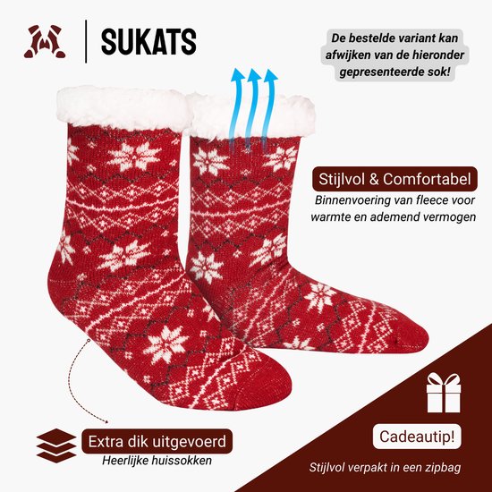Twee rode kerstsokken met wit patroon, witte fleece voering. Blauwe pijlen tonen luchtdoorlatendheid. Tekst: Stijlvol & Comfortabel, Extra dik uitgevoerd.