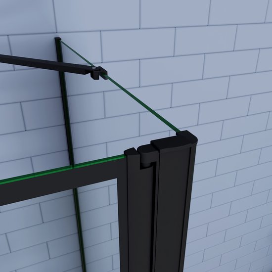 Gros plan des charnières et des profilés noirs de la paroi de bain avec verre vert sur des carreaux bleus.
