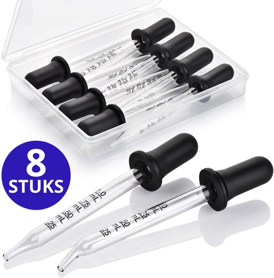 Huit pipettes en verre avec des capuchons noirs, dont deux hors de l'emballage.