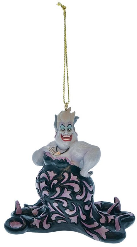 Ursula ornament in zwart met roze patronen, paars, met tentakels. Zittend met handen op haar schoot.