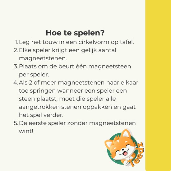 Man en jongen spelen spel met zwarte magneten op een gele cirkel.
