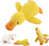 Yellow duck plush toy shown from different angles and with a small dog.