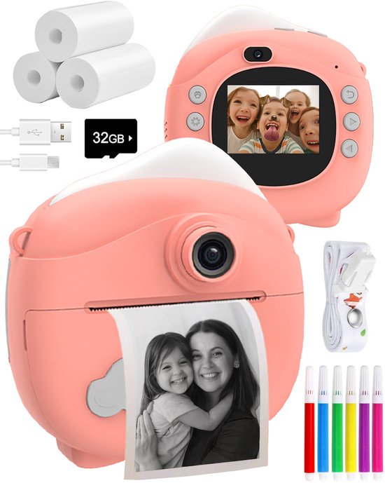 Roze instant print camera met opgerolde fotopapier, 32GB SD-kaart, oplaadkabel en kleurpotloden.