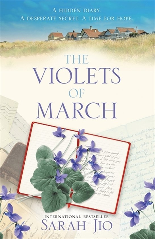 Boek kaft: 'The Violets of March' met een open dagboek, viooltjes en handgeschreven brieven. Tekst: 'A HIDDEN DIARY. A DESPERATE SECRET. A TIME FOR HOPE.'